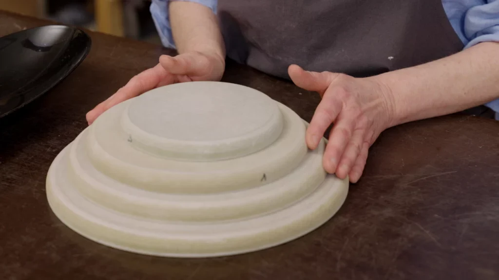 Kathleen staat bij een drukmal